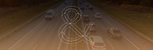 Firm Logo in front of highway